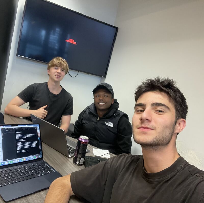 Daniel, Batu and Nathaniel working together at Kupaeli